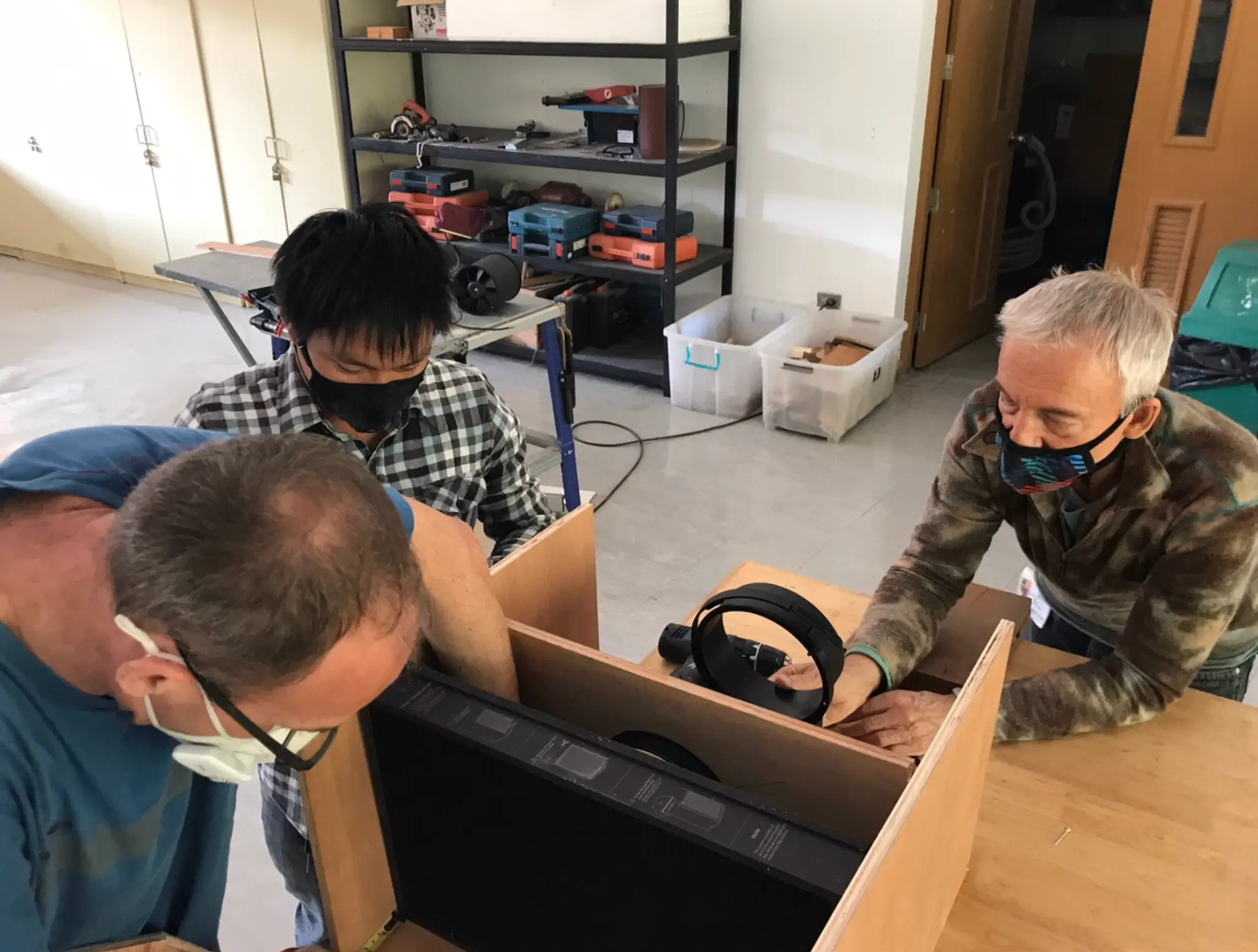 AirGradient team building a positive-pressure system